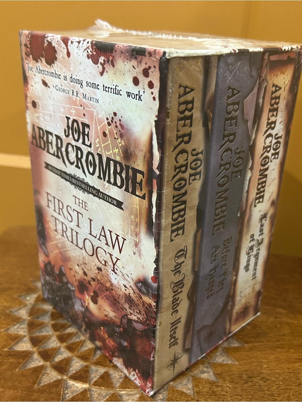 Joe Abercrombie The First Law Trilogy Boxed Set - White, Brown, Red Artwork